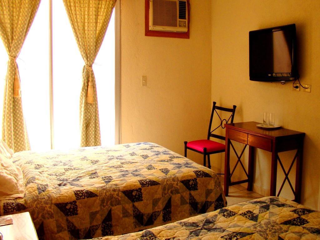 تيجوسيجالبا Apart-Hotel River View الغرفة الصورة